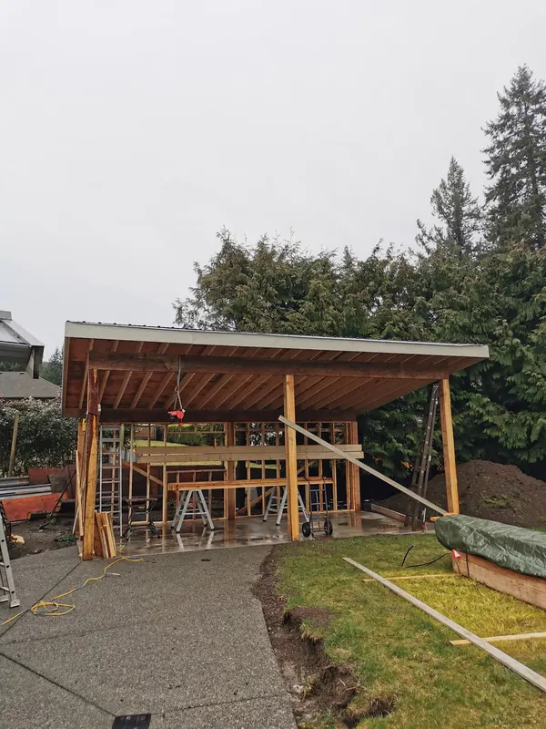 Lean-to shed framing on a concrete pad