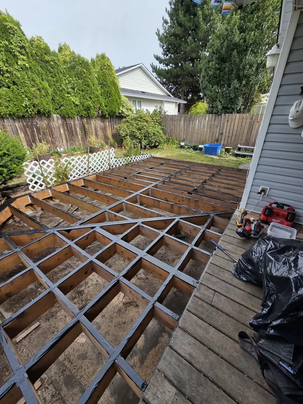 Old deck stripped back to joists with new joist tape ready for re-decking