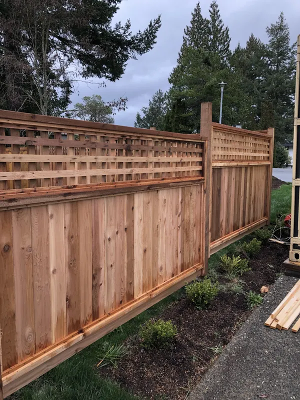 New cedar privacy fence with lattice top panels