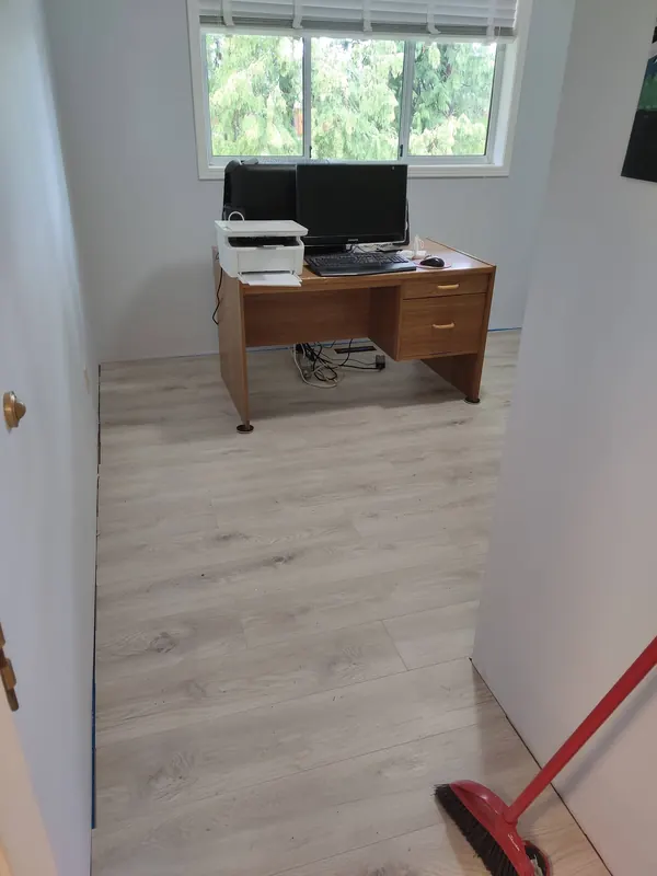 New light laminate flooring in a home office